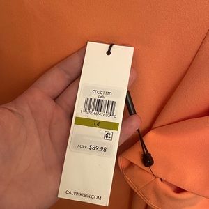 Calvin Klein dress peach in color